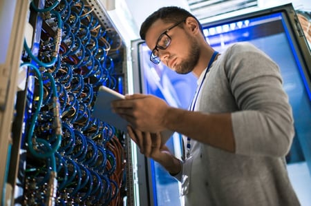 IT professional in a server room